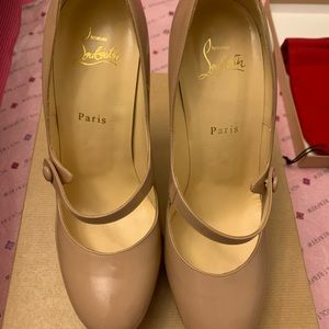 Authentic Nude Platform Louboutin heels.